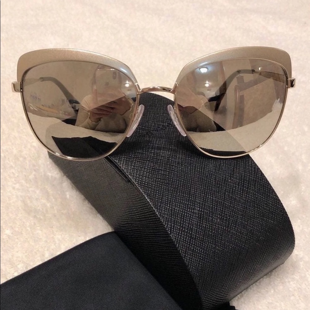 Prada Sunglasses in Gold